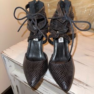 Steve Madden Black snake skin strappy tie heels. Like New. Woman’s size 6.